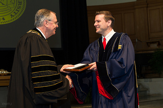 Prof. Thonhauser recieves the WFU Award for Excellence in Research from President Hatch